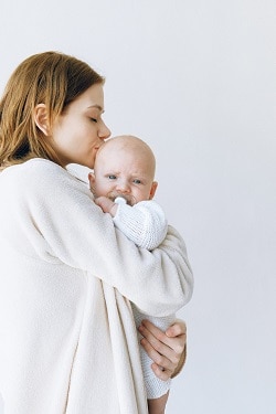 Mother holding child