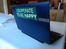 Bumper sticker on laptop computer
